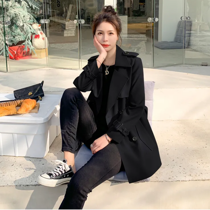 Stylish women's trench coat with a flattering fit. Comfortable and chic outerwear for any season.