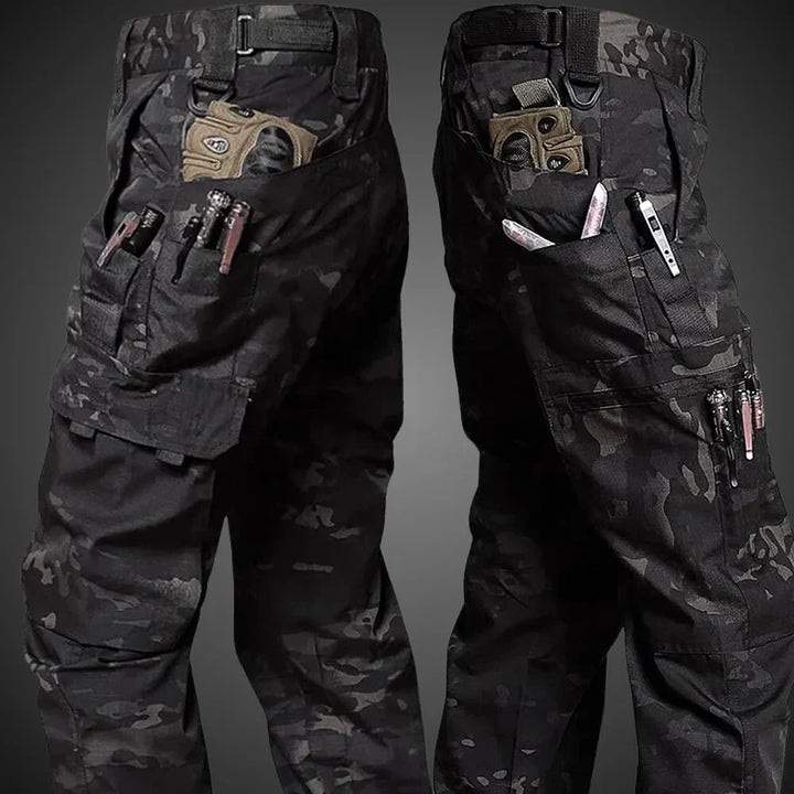 Black Unisex Elite Tactical Cargo Pants with multiple cargo pockets, perfect for outdoor, utility, and casual everyday wear.