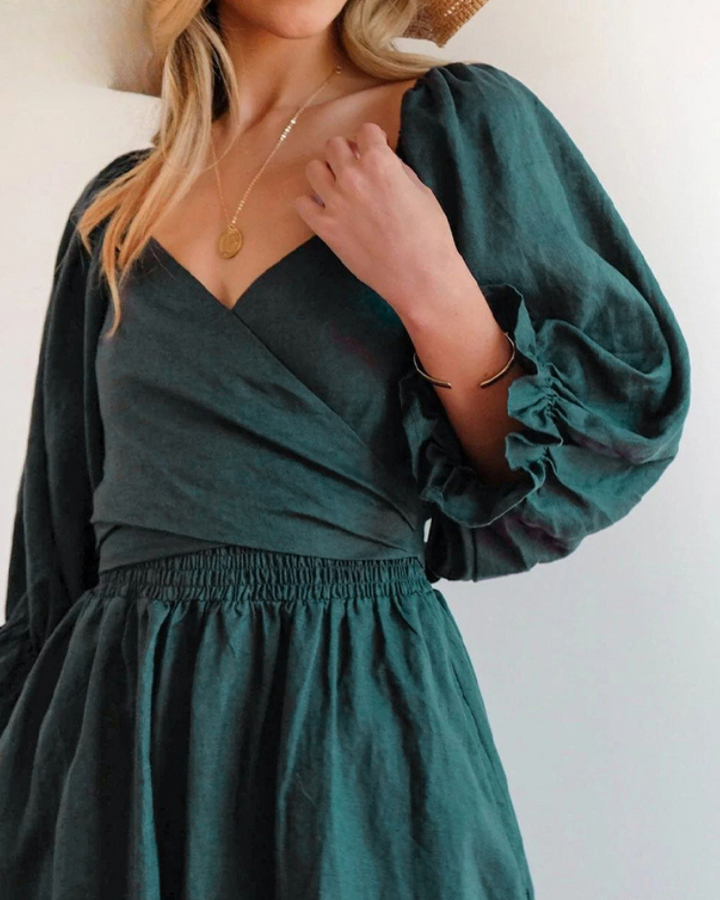 Elegant women's occasion wear midi dress, chic French ruffle sleeves, flattering fit.