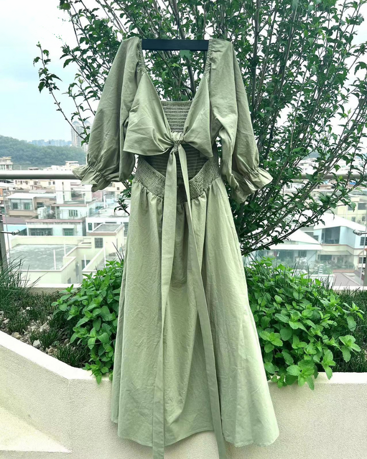 Flattering women's elegant midi dress with stylish French ruffle sleeves, perfect for parties.
