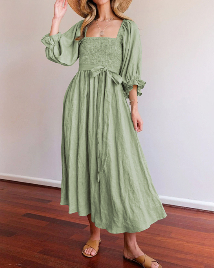 Party-ready women's elegant midi dress, chic design with flattering French ruffle sleeves.