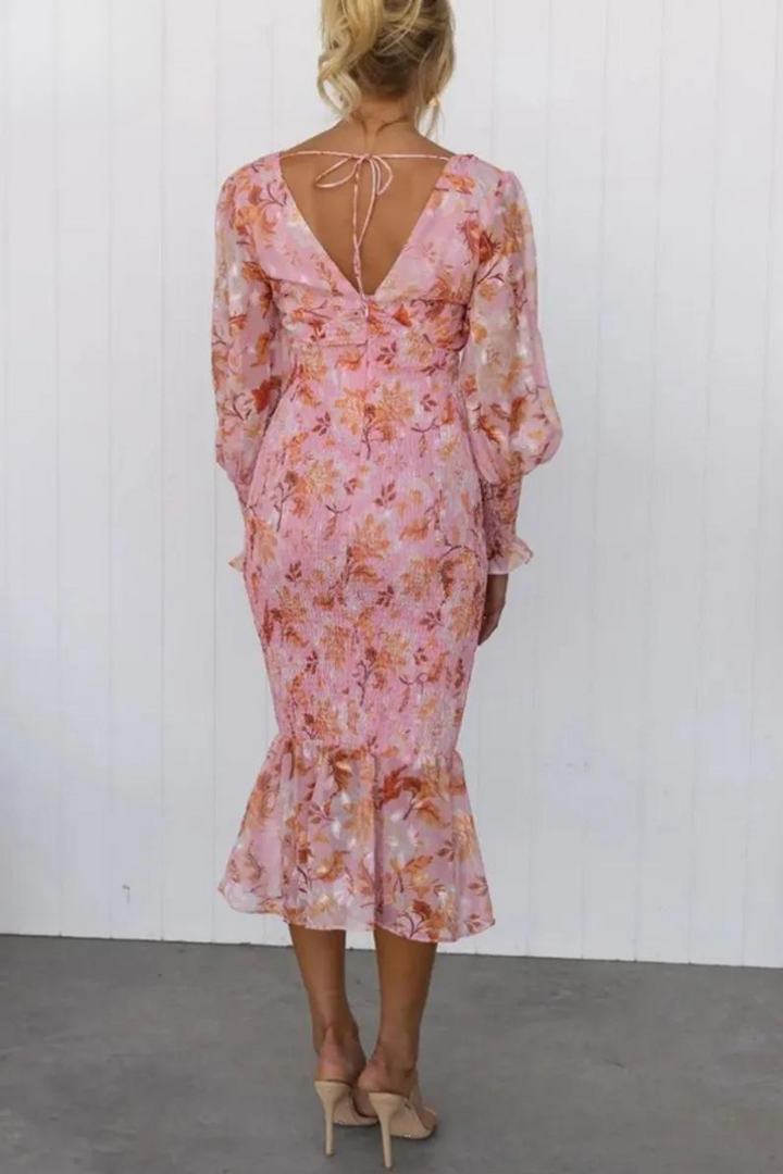 Vibrant floral print midi dress for women, featuring puff sleeves & a comfortable spring/summer fit.
