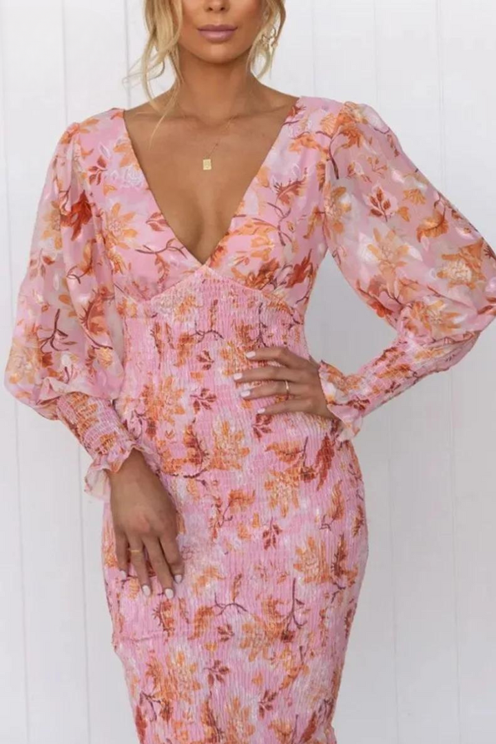 Women's V-neck floral midi dress with chic puff sleeves. Ideal for elegant spring & summer style.