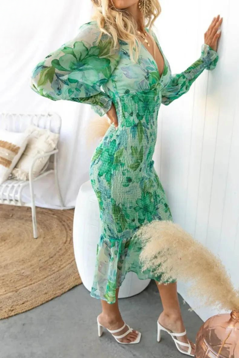 Lightweight women's floral midi dress with V-neck & puff sleeves. Perfect spring & summer casual wear.
