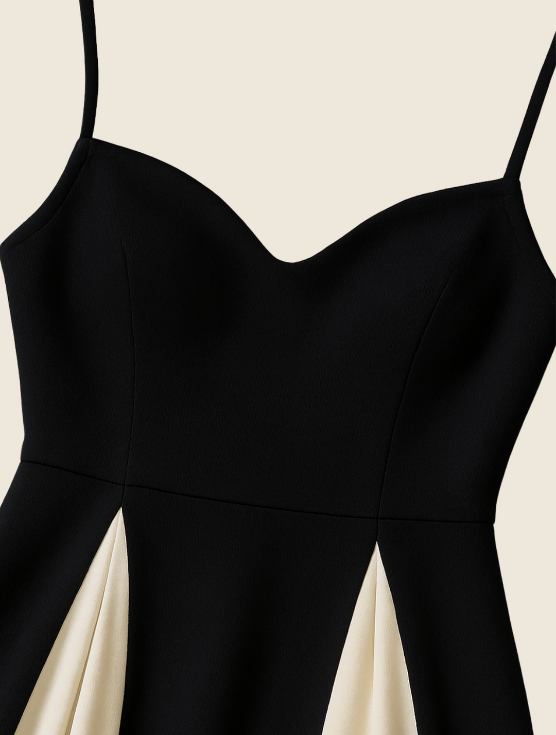 Women's elegant black maxi dress featuring a stylish contrast panel. Sleeveless design, suitable as an evening gown.