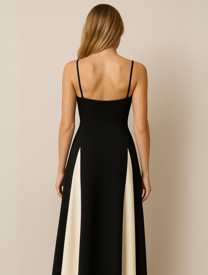 Chic women's black maxi dress with an elegant contrast panel. Sleeveless, ideal formal wear or party dress for women.