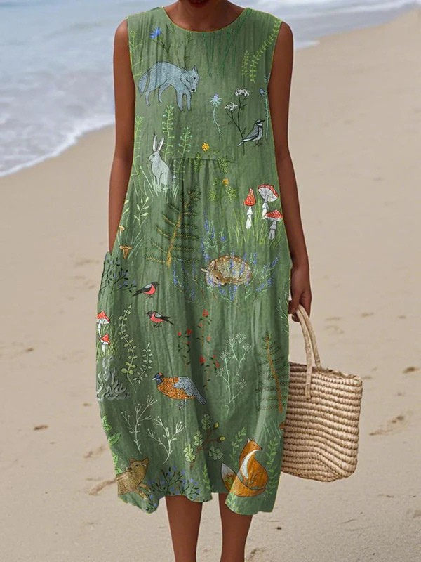 Women's green woodland floral midi dress. Flowy & comfortable, perfect for spring/summer casual or elegant wear.