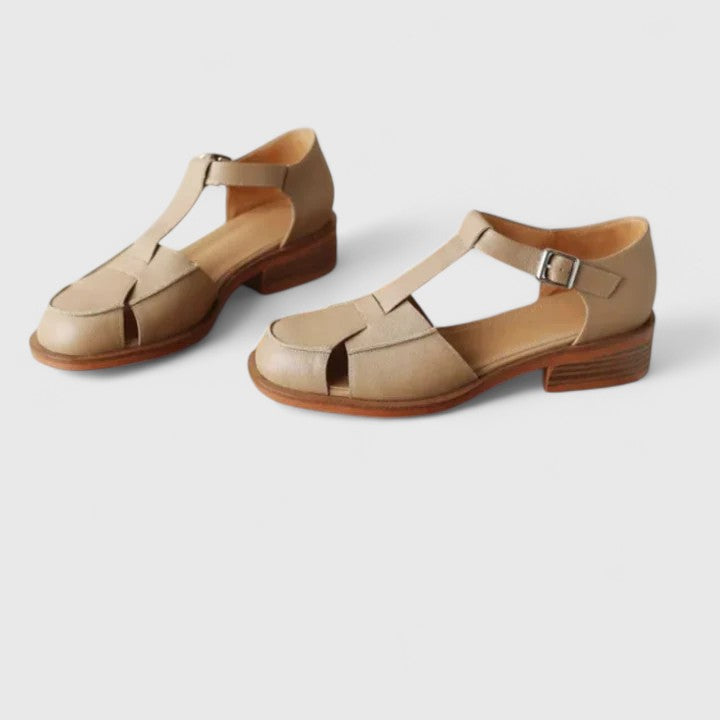 Elegant women's closed-toe T-strap sandals in khaki, designed for secure fit and all-day comfort.