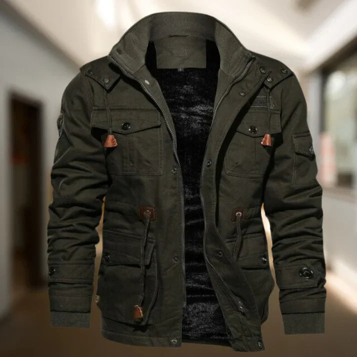 Rugged men's hooded utility jacket with multiple pockets & adjustable cuffs, perfect for casual autumn/winter wear.