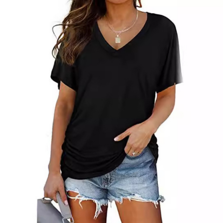 Women's classic V-neck loose fit shirt. Perfect for casual elegance, a comfortable everyday top.