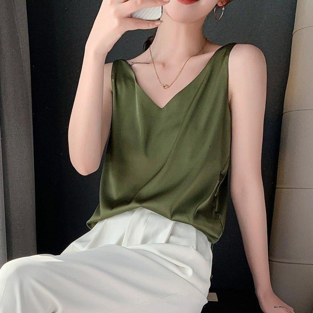 Women's draped V-neck sleeveless tank top, elegant & versatile for smart casual outfits.