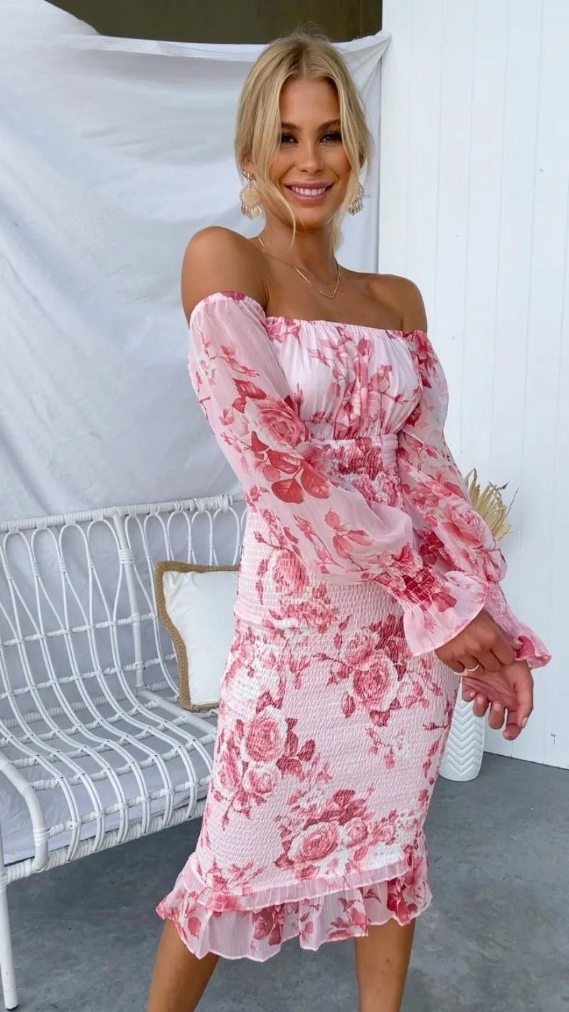 Stylish women's midi dress featuring vibrant floral print & flattering off-shoulder ruffled neckline.