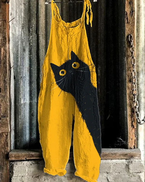 Women's yellow classic cat print jumpsuit. Lightweight, chic & comfortable one-piece for casual summer wear. Playful fashion.