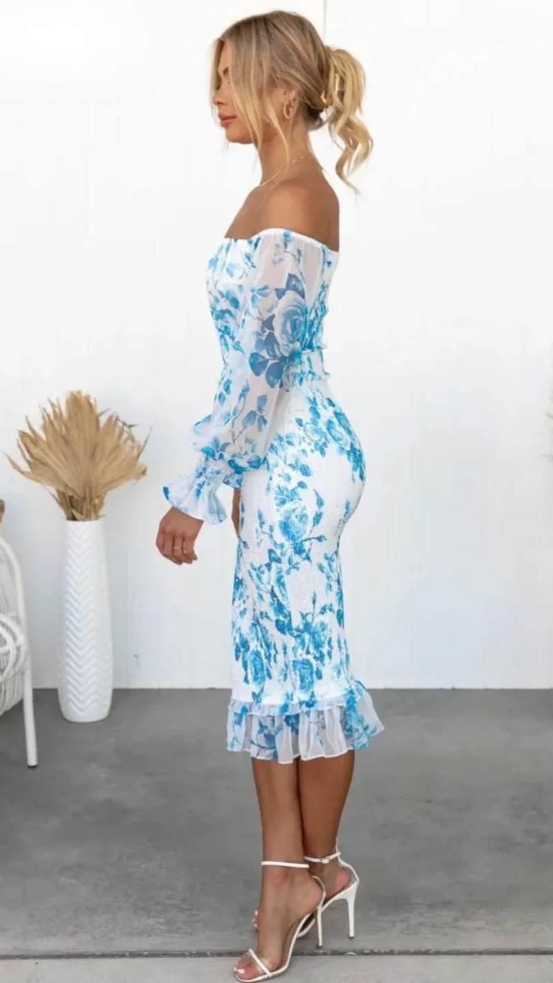 Front view of a beautiful floral off-shoulder ruffle midi dress, perfect for a wedding guest or summer party.