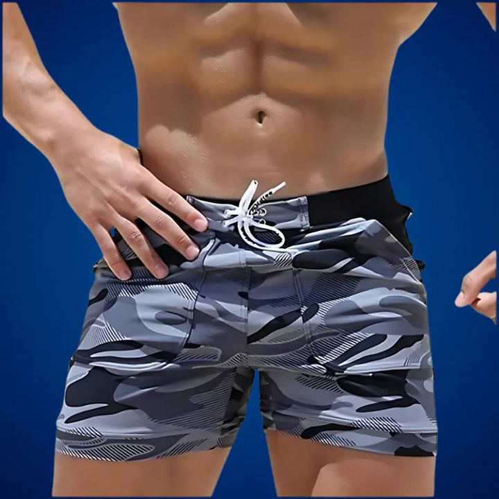 Men's quick-dry swim shorts, ideal for beach, pool, and summer vacations. Fast-drying swimwear for active men.