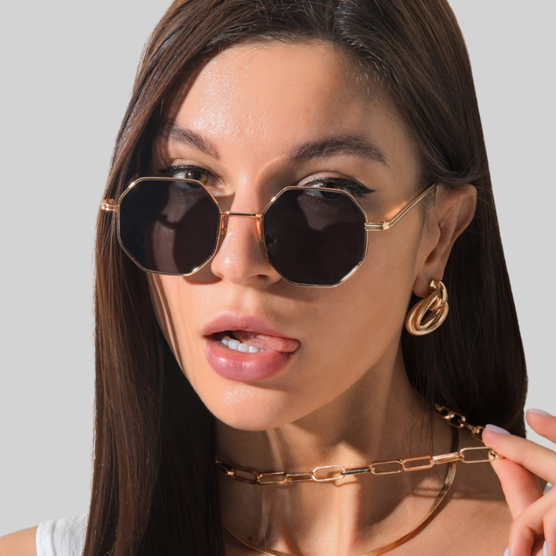 Trendy women's money sunglasses, featuring a unique polygonal metal frame and resin lenses.