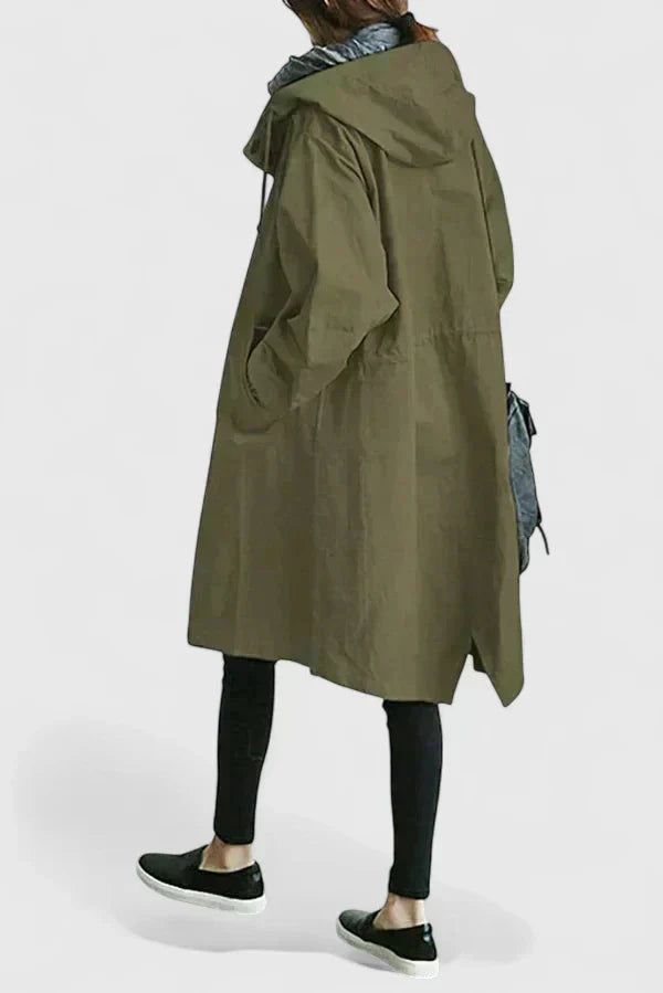 Long women's oversized rain coat. Versatile outerwear for protection against rain & wind, suitable for autumn.