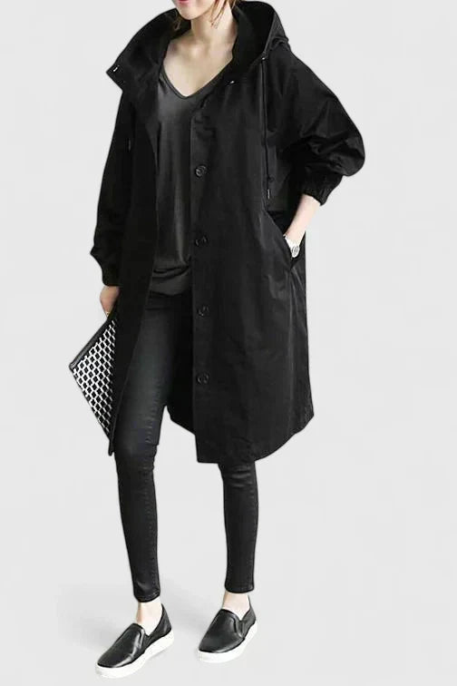 Elegant women's oversized rain jacket. Practical for rain protection, stylish for casual and everyday outfits.