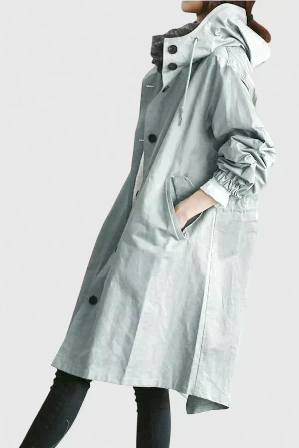 Comfortable oversized rain coat for women. Stylish, practical, and windproof for autumn and everyday wear.