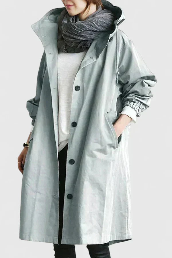 Stylish women's oversized rain coat, comfortable and practical. Perfect for wet weather protection and everyday wear.