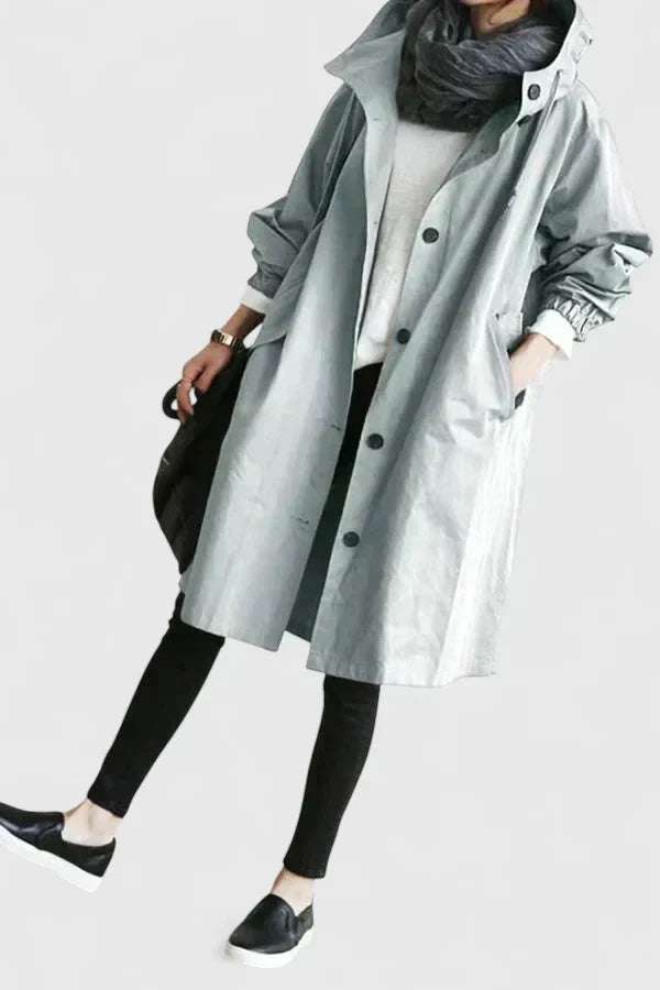 Windproof & waterproof women's oversized rain coat. Stay dry in style, perfect versatile outerwear for autumn.