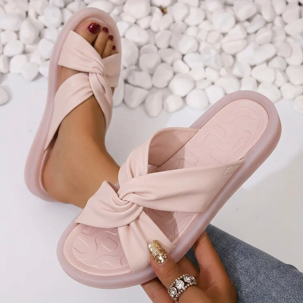 Women's cushioned twist crossover sandals with open toe for all-day comfort, perfect for summer casual wear.