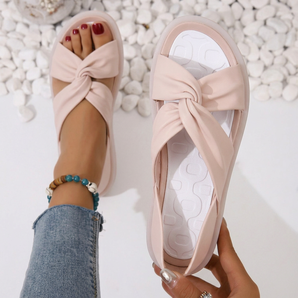 Stylish women's summer sandals with soft cushioned footbed & chic twist crossover straps, ideal for casual comfort.