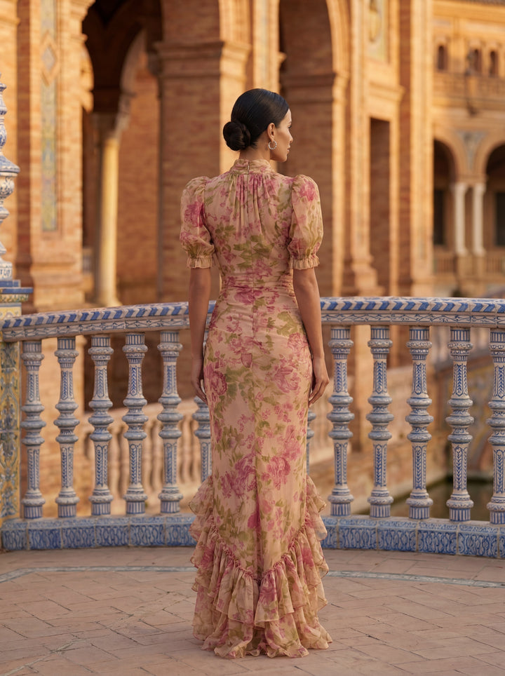 Flowy high-neck women's midi dress featuring a vibrant floral watercolor print, ideal for spring fashion.