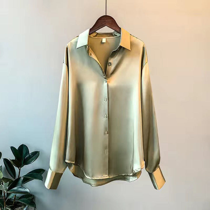 Stylish women's long-sleeve blouse, an elegant luxury top offering versatile fashion for any occasion.