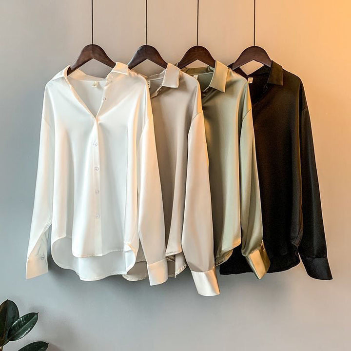 Chic women's long-sleeve blouse, an elegant luxury top designed for office wear and versatile styling.