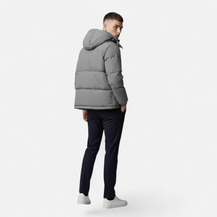 Men's heavy-duty padded jacket with hood, ideal for extreme cold weather.