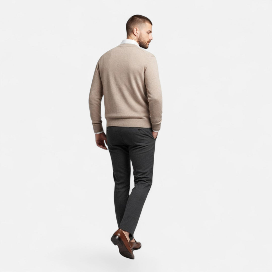 Men's loose V-neck cardigan worn open, showcasing casual layering and comfortable, relaxed fit.