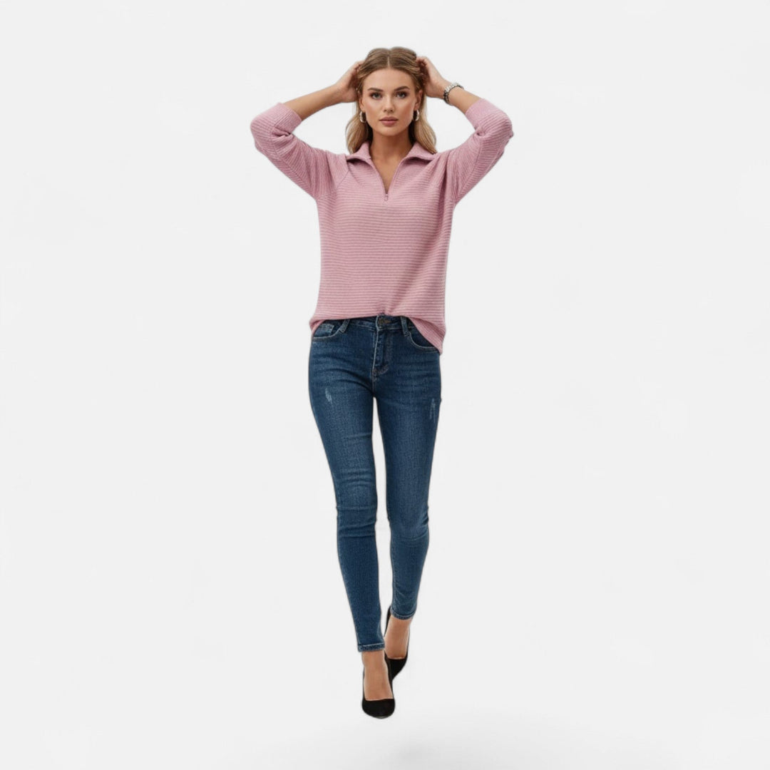 Soft knit women's pullover sweater with a chic stand collar & zipper, ideal for autumn elegance.