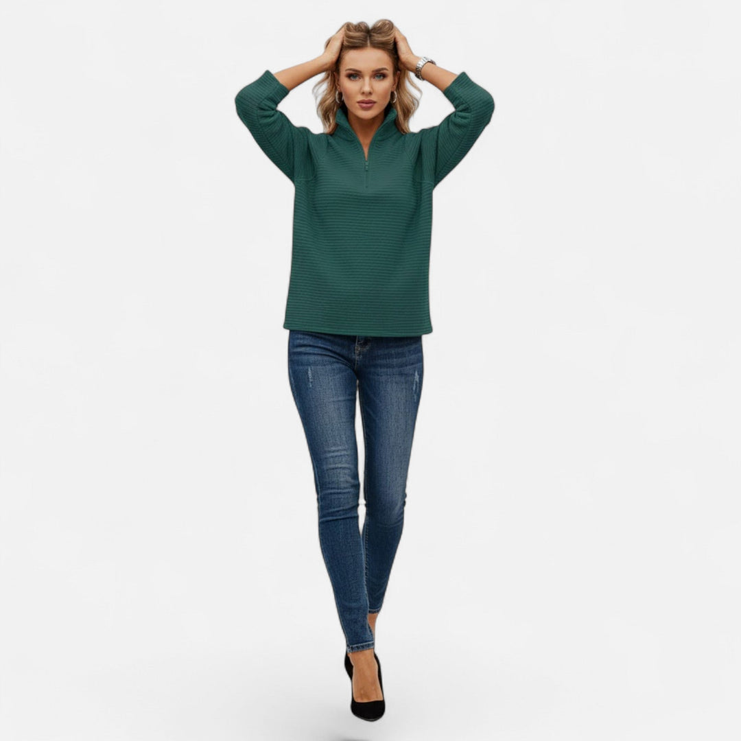 Fashion-forward women's zipper sweater, featuring a stand collar & comfortable long sleeves.