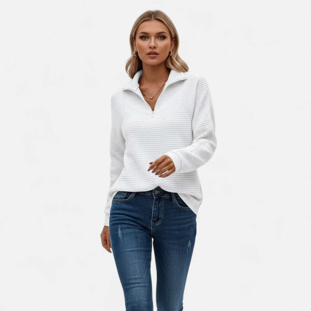 Cozy chic women's long-sleeve zipper sweater. Versatile knitwear for casual wear & office attire.