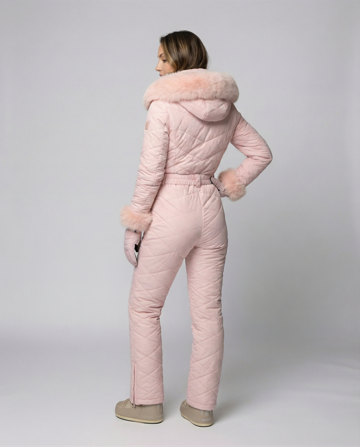 Stylish women's weather-resistant ski overall for snowboarding & winter activewear. Perfect for snow sports.
