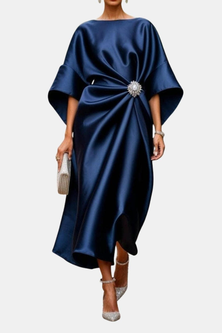 Flowy long maxi dress for women, featuring elegant wide sleeves. Ideal as an evening gown or formal party dress.