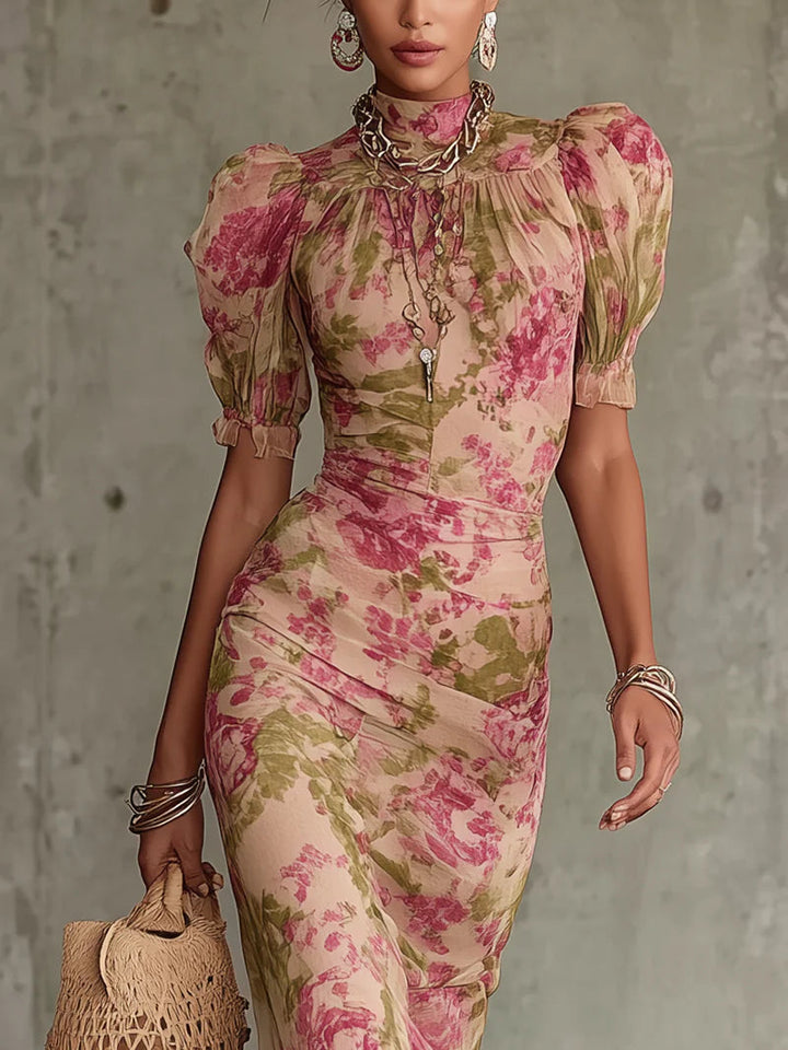 Flowy bohemian women's maxi dress featuring a beautiful vintage rose floral print and stylish puff sleeves, ideal for spring.