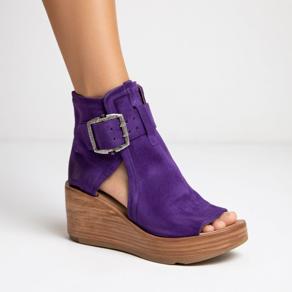 Comfortable purple open toe wedge ankle boots for women. Stylish everyday footwear with confident design.