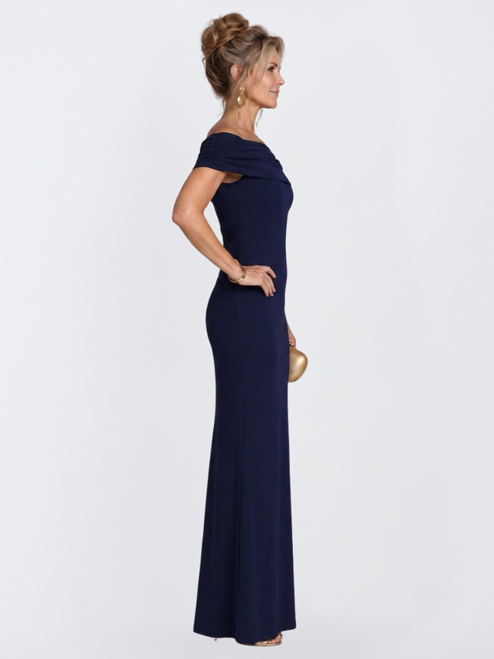 Women's formal bodycon maxi dress, off-shoulder neckline & sophisticated twist back. Ideal for special occasions.