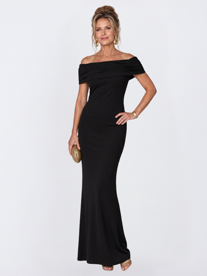 Sophisticated women's off-shoulder party dress, bodycon fit, long length, and eye-catching twist back detail.