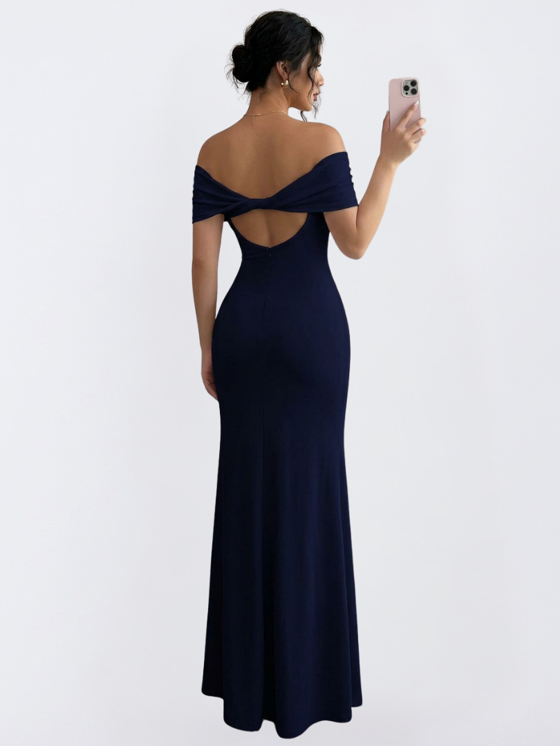 Fitted long off-shoulder dress for women, featuring a trendy twist back and elegant bodycon silhouette.