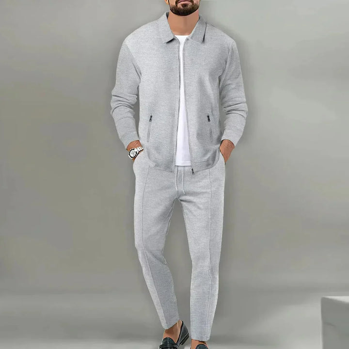Versatile men's slim fit two-piece suit. Modern style perfect for business, parties, or special events.