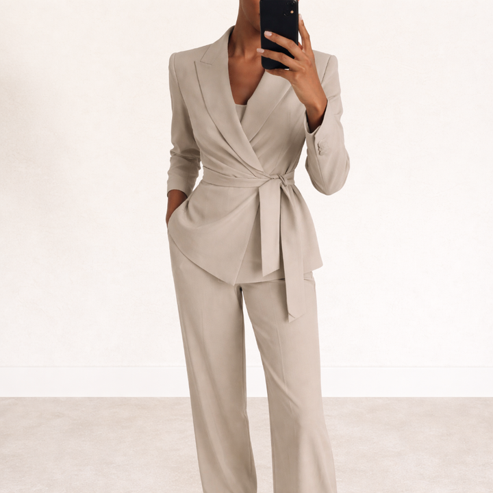 Fashionable women's elegant suit set featuring a tie-waist blazer and comfortable wide-leg pants for a chic look.