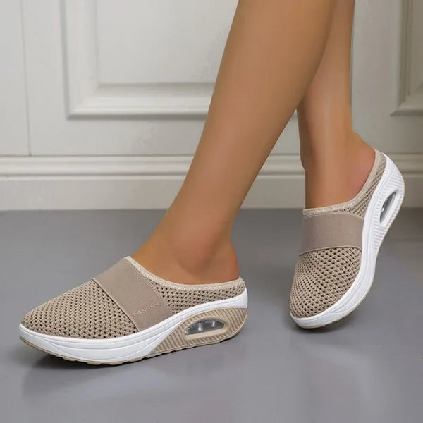 Stylish women's orthopedic wedge sandals offering excellent arch support and comfort for casual outfits.
