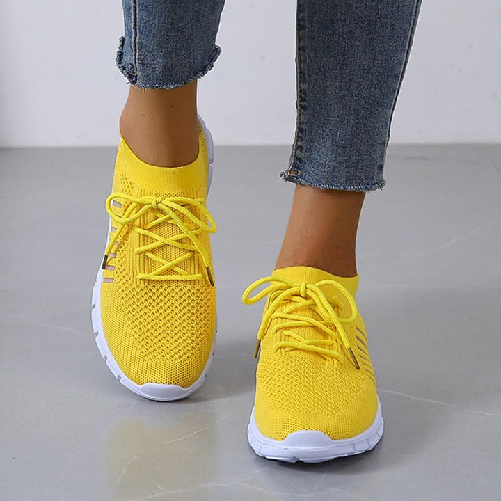 Comfortable women's athletic casual sneakers with advanced arch support for walking.