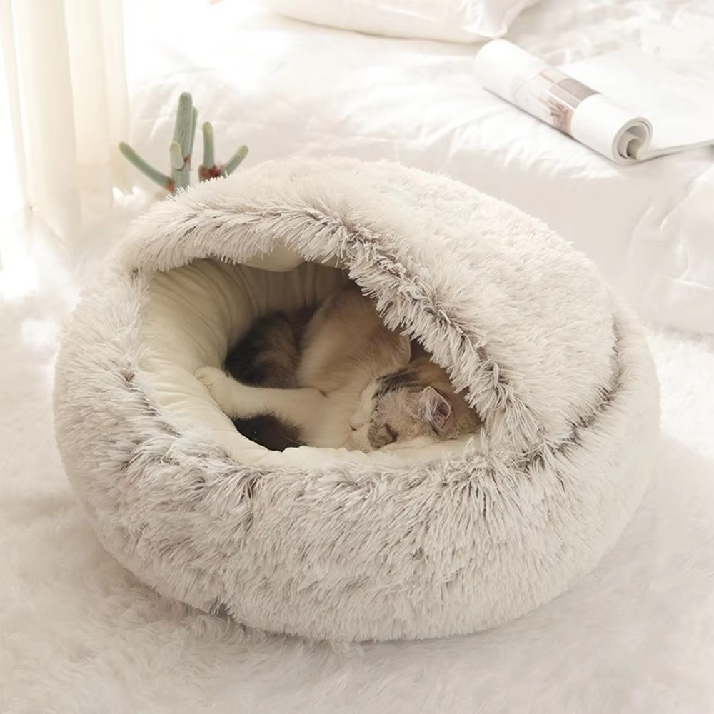 Cozy plush 2-in-1 cat cuddle cave and hideaway, a soft round pet bed for ultimate feline comfort and rest.