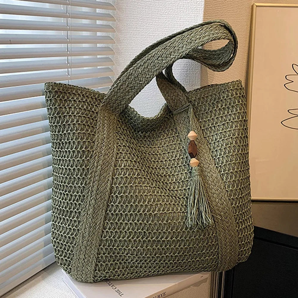 Casual women's woven straw bag, a fashionable summer tote. Natural, lightweight & perfect for any occasion.