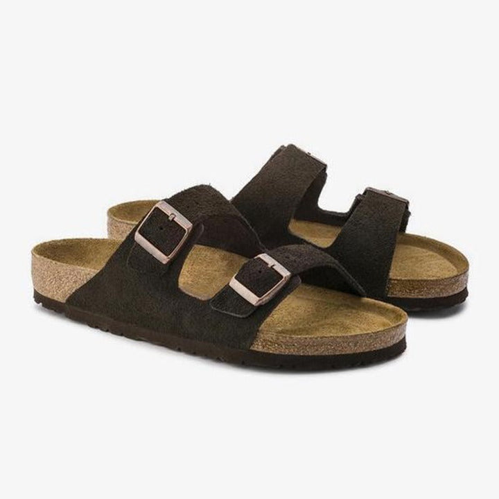 Casual unisex sandals with adjustable straps & supportive cork footbed. Perfect for everyday summer comfort.