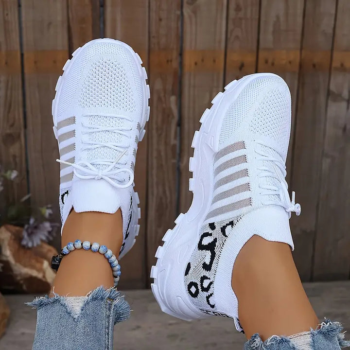 Women's breathable leopard print fashion sneakers for trendy casual wear.